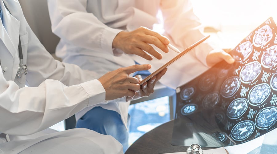 Doctor diagnosing head injury Doctor diagnosing head injury