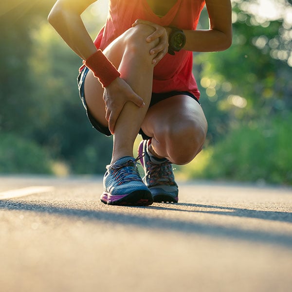 runner dealing with ankle injury on trail runner dealing with ankle injury on trail